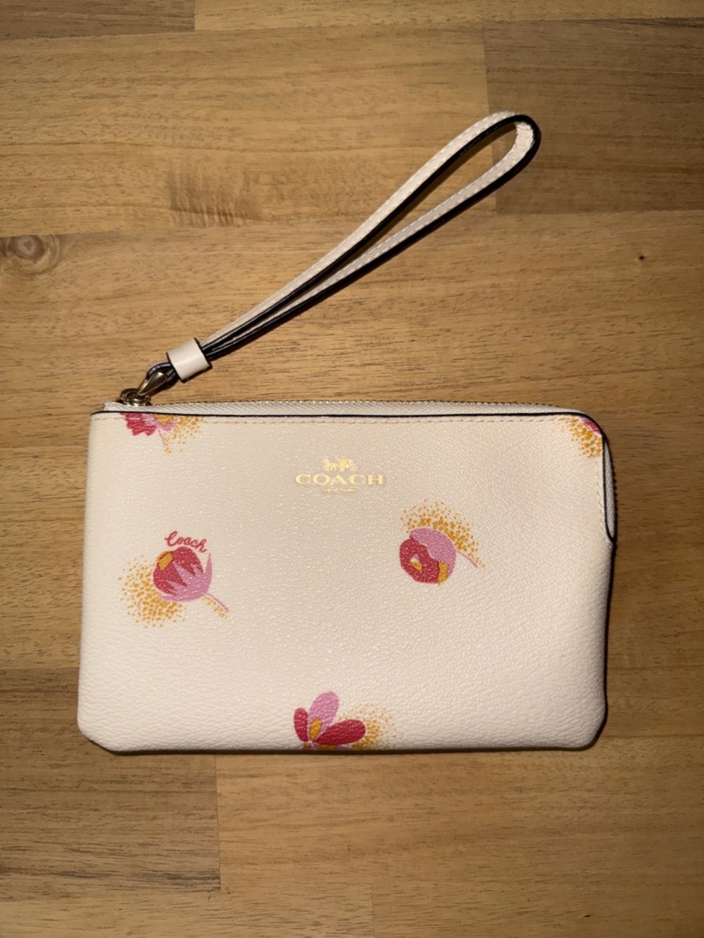 Coach Cream Wristlet with Pink Floral Print and Gold Logo